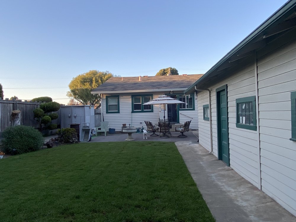 Slide of Urrutia Roofing