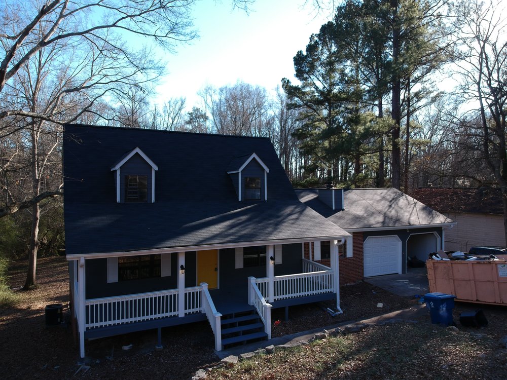 Slide of RST Roofing and Renovations