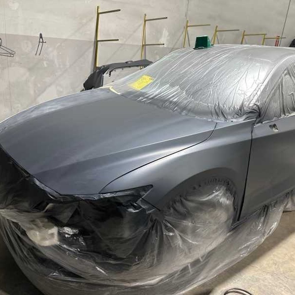 Caliber Collision - Driver side - primer (in process photos) - Body Shops Near Me - Orange, California Caliber Collision - Driver side - primer (in process photos) - Body Shops Near Me - Orange, California