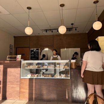 Creamy Seoul - Storefront with smiley staff - Donuts Near Me - Flower Mound, Texas Creamy Seoul - Storefront with smiley staff - Donuts Near Me - Flower Mound, Texas
