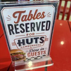 Hut’s Hamburgers - Seating outside of the walls of the restaurant