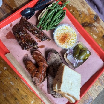 Terry Black's Barbecue - Pork Ribs, Smoked Sausage, and Brisket Creamed corn and green beans - Barbeque Near Me - Dallas, Texas Terry Black's Barbecue - Pork Ribs, Smoked Sausage, and Brisket Creamed corn and green beans - Barbeque Near Me - Dallas, Texas