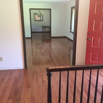 Martinez Flooring - a hallway with a red door - Flooring Near Me - Silver Spring, Maryland