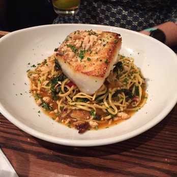 Biscottis - Thai mango-braised sea bass, lo mein pasta, Chinese broccoli, shiitake mushrooms, and toasted peanuts ($34) - American Near Me - Jacksonville, Florida