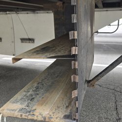 Dr Trailer Repair - Trailer ramp door came apart.
