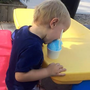 Tiki's Shave Ice - Two year olds don't need spoons. Fun kid's table for guests. - Desserts Near Me Tiki's Shave Ice - Two year olds don't need spoons. Fun kid's table for guests. - Desserts Near Me