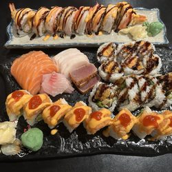 East Hana JC - Tokyo Girl on top, then sweet potato roll, spider roll, then Spicy Girl Roll. Sashimi: salmon, white tuna, pepper tuna, and red snapper