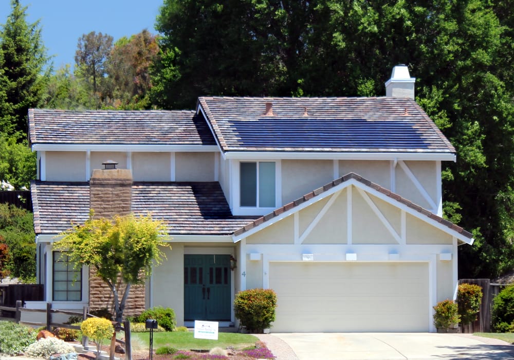 Slide of Manada Roofing