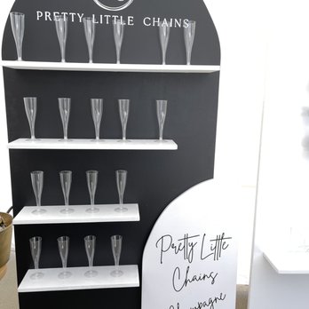 Simple Little Occasions - Shelf wooden backboard (Susan) as champagne backboard. - Party Equipment Rentals Near Me Simple Little Occasions - Shelf wooden backboard (Susan) as champagne backboard. - Party Equipment Rentals Near Me