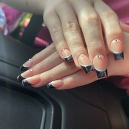 Blue Cat Eye French acrylics with sliver glitter and jewels Blue Cat Eye French acrylics with sliver glitter and jewels
