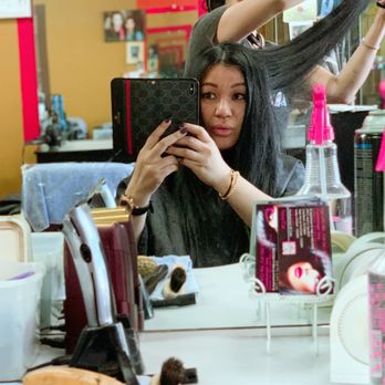 Fancy Cuts - Davy curing off precious inches - Hair Salons Near Me - Long Beach, California Fancy Cuts - Davy curing off precious inches - Hair Salons Near Me - Long Beach, California