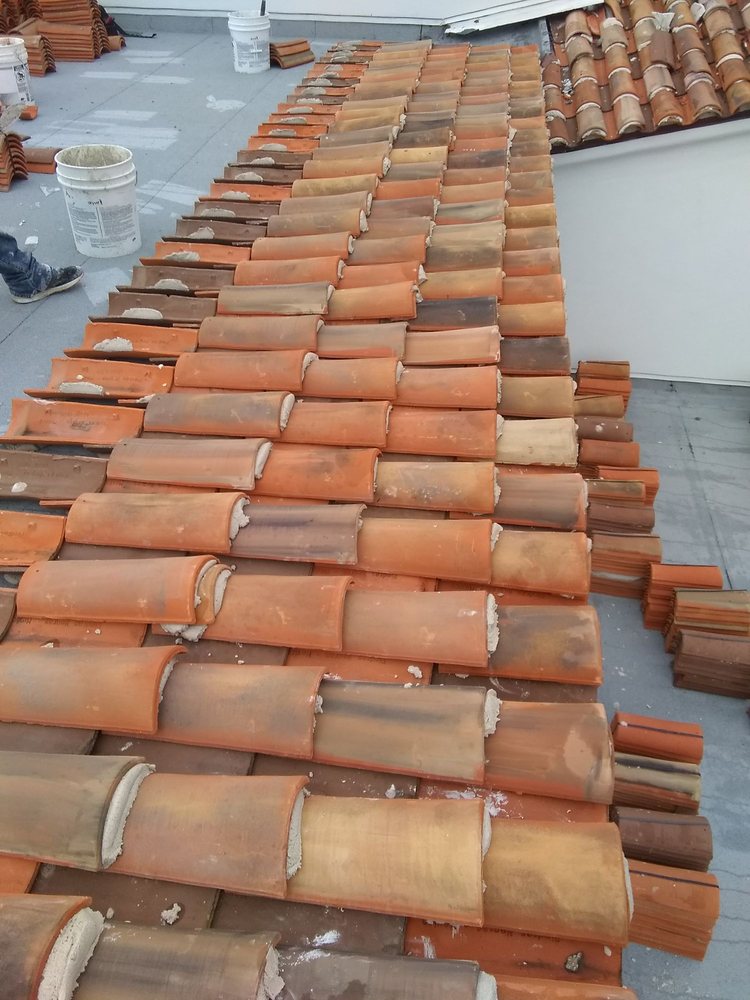 Slide of Camacho Roofing Construction