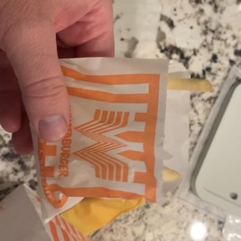 Whataburger - French fry envelope, with a sample of what it should be holding more of - Burgers Near Me - Kingwood, Texas