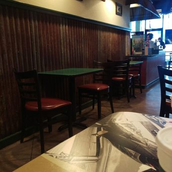 Wingstop - the interior of a fast food restaurant - Chicken Wings Near Me - San Antonio, Texas