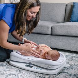 More Than Milk - I bring an infant scale to my visits so that we can check the baby's weight and also assess how much the baby transfers while breastfeeding.