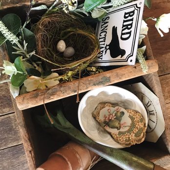 Dusty Finds - Old tool carrier, bird's nest, ironstone jello mold, Spring floral wreath, terra cotta pots, old clock face - Antiques Near Me - Denton, Maryland