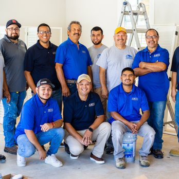 Amco Restoration - a group of men posing for a picture - General Contractors Near Me - Rogers, Arkansas Amco Restoration - a group of men posing for a picture - General Contractors Near Me - Rogers, Arkansas
