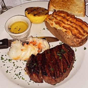 La Cave - Filet mignon + 1/2 lobster tail with twice baked potato. - Steakhouses Near Me - Costa Mesa, California La Cave - Filet mignon + 1/2 lobster tail with twice baked potato. - Steakhouses Near Me - Costa Mesa, California