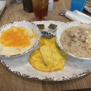 Woodside Restaurant - Brisket and Gravy with a side of cheese grits - Sandwiches Near Me - Gulf Shores, Alabama Woodside Restaurant - Brisket and Gravy with a side of cheese grits - Sandwiches Near Me - Gulf Shores, Alabama
