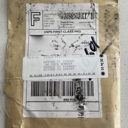 US Post Office - A retuned package after being lost at the PO for almost 45 days.  Of course the contents was removed!  Looks like it was run over by a truck