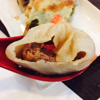Dumpling Cafe - Inside of mini crab and pork soup dumpling - Taiwanese Near Me - Boston, Massachusetts Dumpling Cafe - Inside of mini crab and pork soup dumpling - Taiwanese Near Me - Boston, Massachusetts