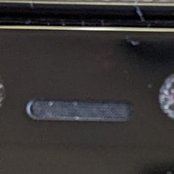 Cali-Phonia Computer & Phone Repair - Folsom - Dust and fingerprints between the camera lenses and the glass.