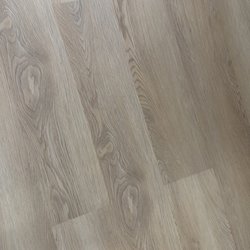 EFO furniture outlet - A bare floor covered by the rug that never came