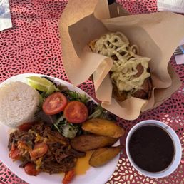 Ropa Vieja Plate and roast pork Tostones