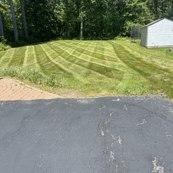Oli's Lawn-scaping - a freshly mowed lawn - Landscaping Near Me Oli's Lawn-scaping - a freshly mowed lawn - Landscaping Near Me