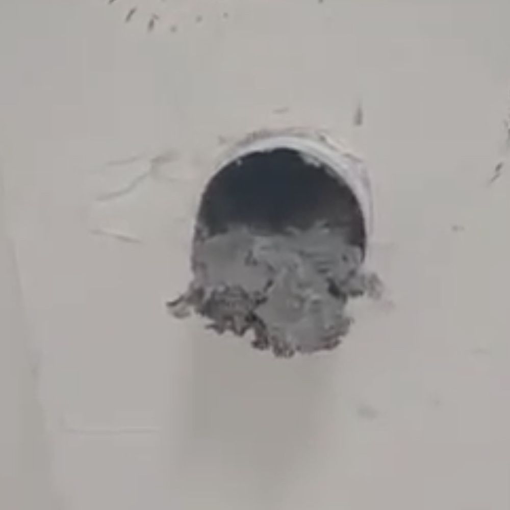 Mighty Ducts and Chimneys - This is the before photo with sand and lint packed in the dryer vent - Chimney Sweeps Near Me - San Diego, California Mighty Ducts and Chimneys - This is the before photo with sand and lint packed in the dryer vent - Chimney Sweeps Near Me - San Diego, California