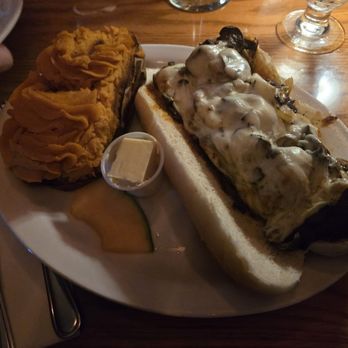 Kennedy's Cove - Sunday steak sandwich and look at that twice baked sweet potato.  Fabulous!! - Steakhouses Near Me - Clarence, New York