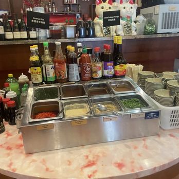 Grand HotPot - Sauce Bar (behind bar there's also steamed rice or rice porridge w/scallops) - Hot Pot Near Me - Pacifica, California Grand HotPot - Sauce Bar (behind bar there's also steamed rice or rice porridge w/scallops) - Hot Pot Near Me - Pacifica, California