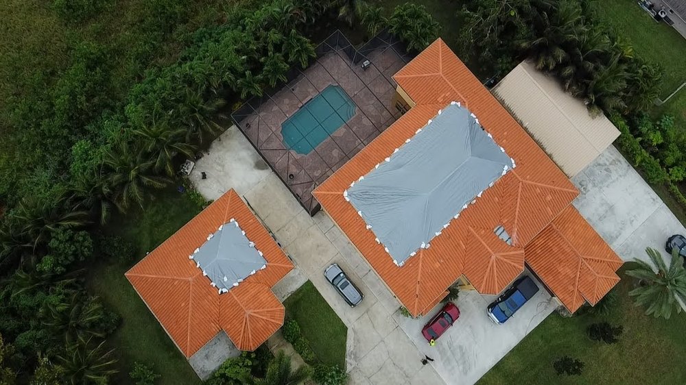 Slide of RoofTop Tarping