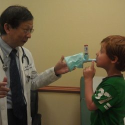 Y Howard Pung, MD - Dr. Pung teaching Tanner how to use an InspirEase spacer.