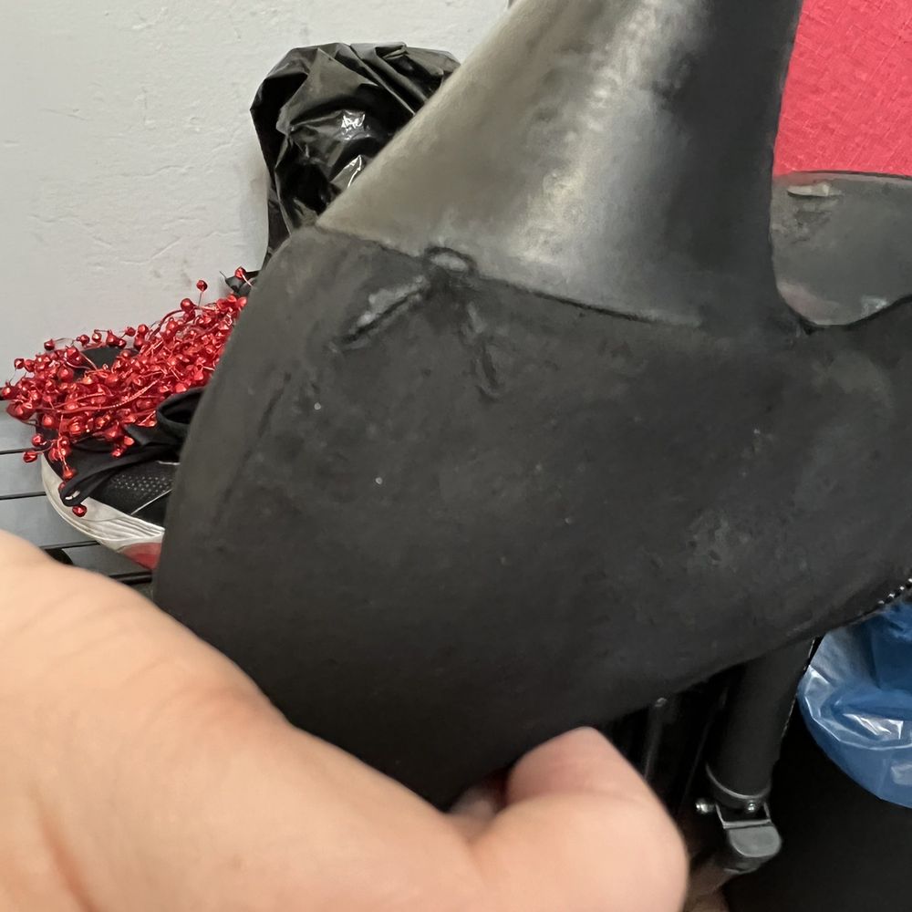 Bob's Shoe and Leather Service - New v-shaped puncture/cut in the back of the heel - Shoe Repair Near Me - Brooklyn, New York Bob's Shoe and Leather Service - New v-shaped puncture/cut in the back of the heel - Shoe Repair Near Me - Brooklyn, New York