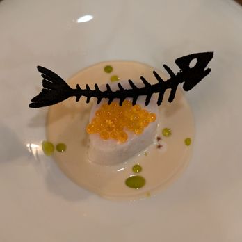 ADEGA Restaurant - Swordfish in white sauce, topped with steelhead trout roe, dotted with dill oil, garnished with a squid ink tile. - Portuguese Near Me - San Jose, California