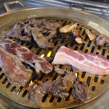 Boon Dee Moo Ka Ta - Grilling the Meats - Thai Near Me - Flushing, New York