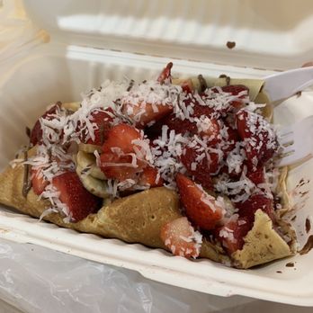 Sunshine Crepes - Strawberry, banana, Nutella, and coconut flakes - Breakfast & Brunch Near Me - Bethany Beach, Delaware Sunshine Crepes - Strawberry, banana, Nutella, and coconut flakes - Breakfast & Brunch Near Me - Bethany Beach, Delaware