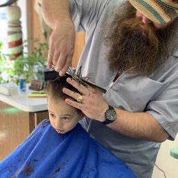 They have a tv so the kids can watch it during their haircut They have a tv so the kids can watch it during their haircut
