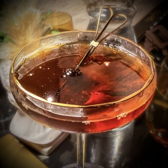 Elizabeth's Italian - "Collection Day" -- Black Manhattan made with Woodford Double Double Bourbon, Averna, and chocolate bitters - Italian Near Me - Old Bridge, New Jersey Elizabeth's Italian - "Collection Day" -- Black Manhattan made with Woodford Double Double Bourbon, Averna, and chocolate bitters - Italian Near Me - Old Bridge, New Jersey