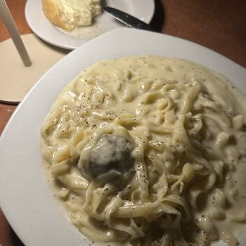 Canale's Restaurant - Fettuccini Alfredo with a homemade meatball. Bread with olive oil. - Pizza Near Me - Oswego, New York Canale's Restaurant - Fettuccini Alfredo with a homemade meatball. Bread with olive oil. - Pizza Near Me - Oswego, New York