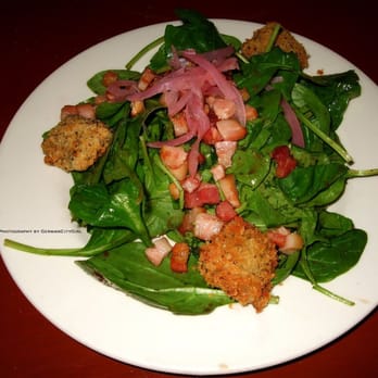 Saltoro - Spinach salad with cubed bacon, brie, grapes, citrus onions + anise vinaigrette. - Italian Near Me - Seattle, Washington Saltoro - Spinach salad with cubed bacon, brie, grapes, citrus onions + anise vinaigrette. - Italian Near Me - Seattle, Washington