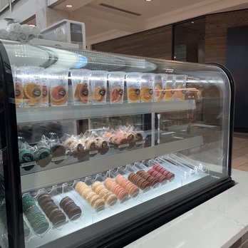Kokee Tea - a variety of donuts in a display case - Bubble Tea Near Me - Atlanta, Georgia