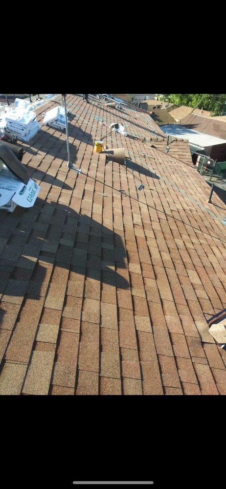 Slide of The Local Roofers and Builders