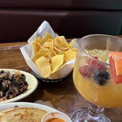 Cozumel Mexican Grill - The shelf margarita and the homemade orange sauce (hot!) are definitely the stars in this photo