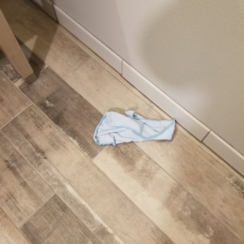 Hotel Peppertree Bend, BW Premier Collection - Found on the bathroom floor on our 3rd day, probably left behind by the housekeeper.  The hair behind the toilet still wasn't cleaned up. - Hotels Near Me - Bend, Oregon