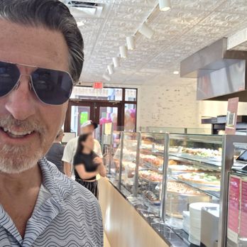 Slice Shop - ROSARIO S. CASSATA AT THE SLICE SHOP IN DOWNTOWN NAPLES FLORIDA. - Pizza Near Me - Naples, Florida