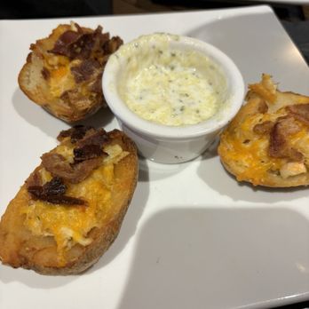 The Hound's Tale - Crab stuffed potato skins were the "hit" of the evening. - New American Near Me - Williamsburg, Virginia
