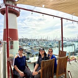 Lighthouse Oyster Bar & Grill - Me w/ my Husband and Son dining at Lighthouse Oyster Bar & Grill with a beautiful View , I love the view here !