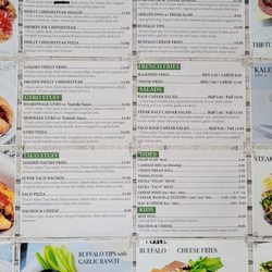 Dina's Vegan Deli & Desserts - Menu on the wall